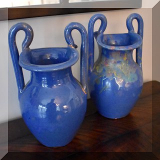 D70. Pair of double handled blue pottery vases. One repaired on handles. 9.5”h x 6”w - $28 for the pair